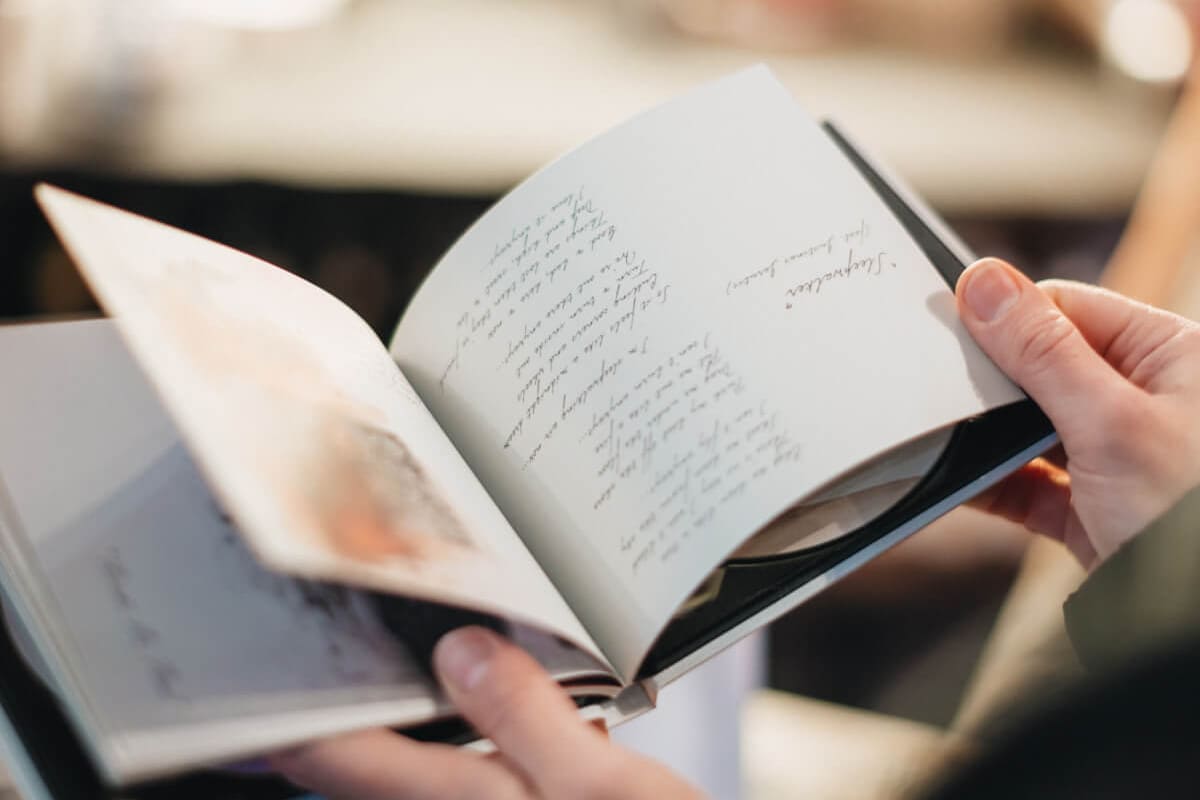 Someone flipping through a book