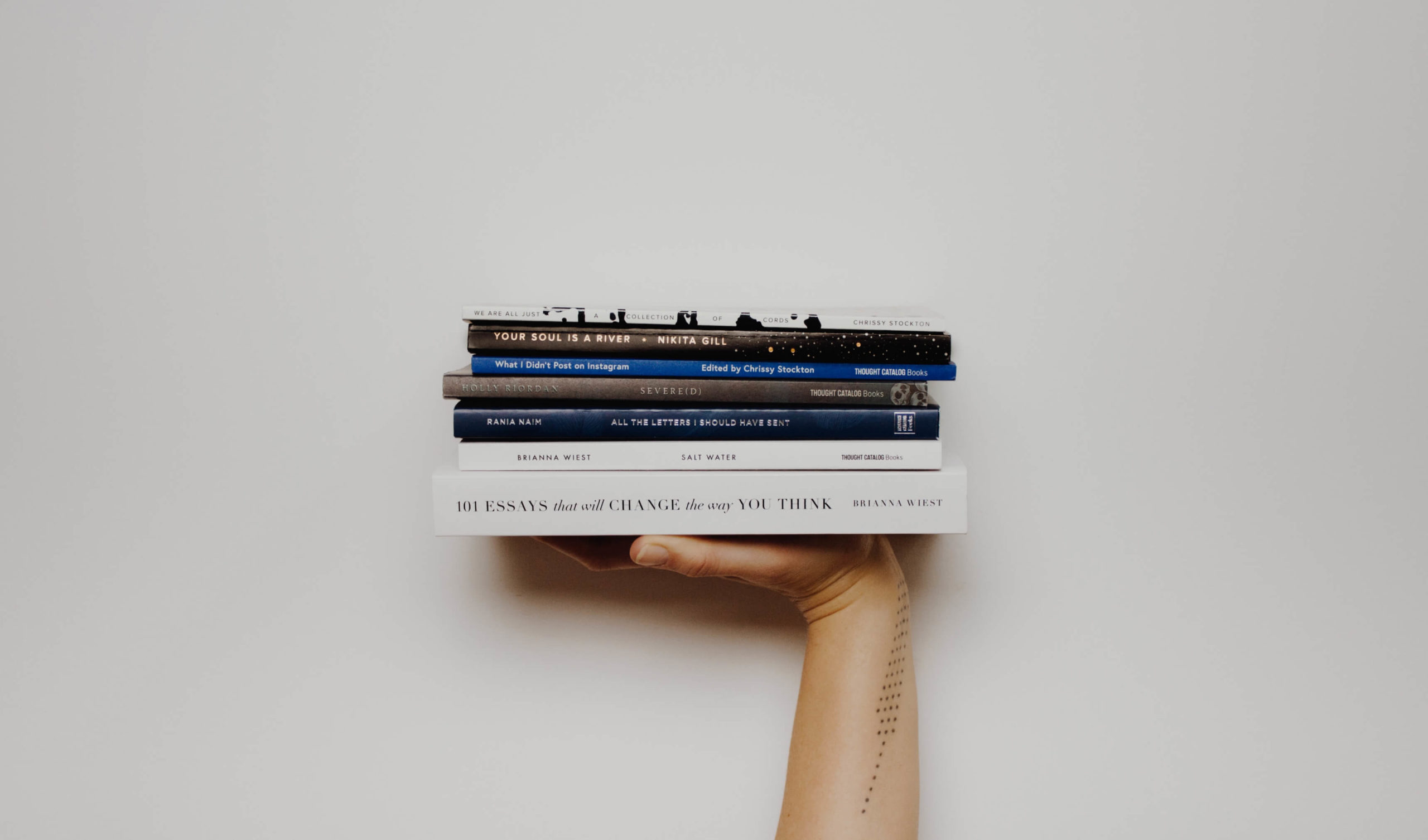 Hand holding books